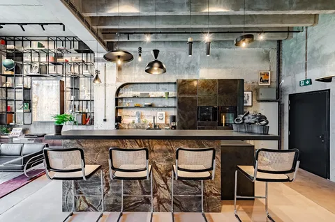 Retro Style With the Smell of Gasoline. Vanguard Presents a Uniquely Designed Model Loft Apartment